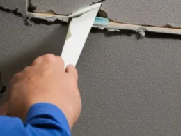 Jak naprawić pękniętą ścianę